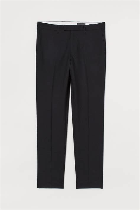 Pantaloni slim in lana in Nero 